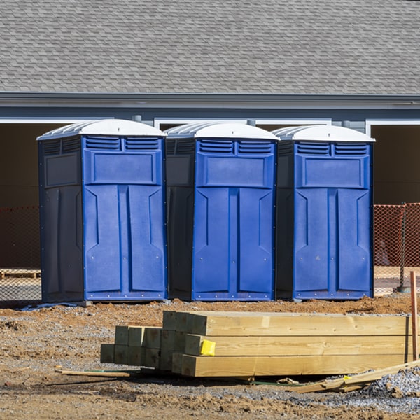 what is the maximum capacity for a single portable restroom in Busby